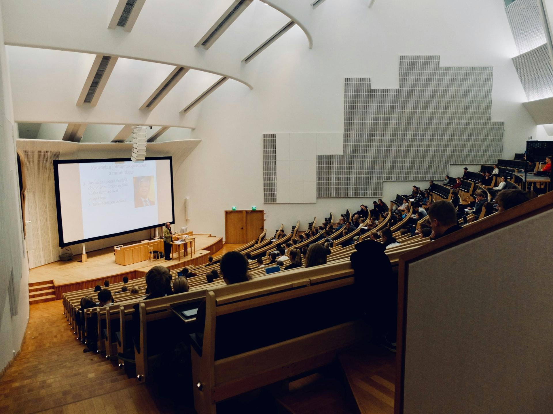 A university lecture hall filled with students